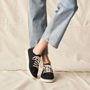 OluKai Pehuea Li woman’s Black nd cream Sneakers